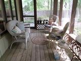 pretty set of white wicker patio furniture