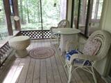 pretty set of white wicker patio furniture