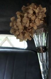 how cool - even has the original crystal bud vases in passenger area