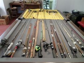 lots of fishing rods & reels