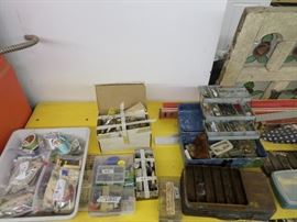 lots of vintage fishing lures, including fly fishing