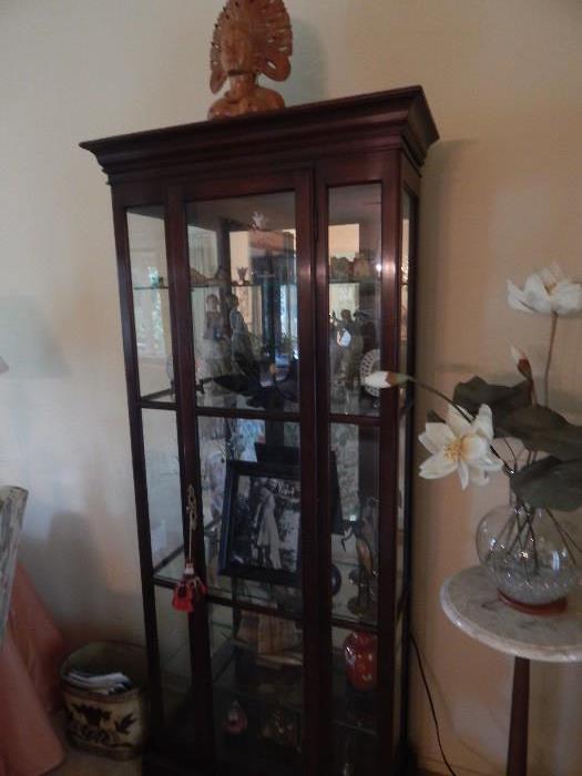 Nice size display cabinet with lights.