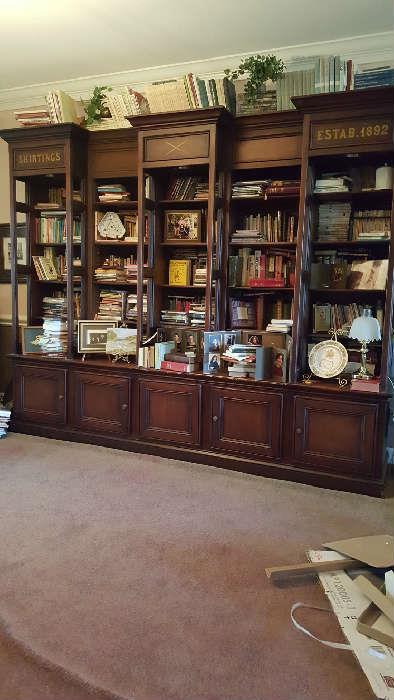 Beautiful Book shelf unit.  Bottom with doors is one piece.  The shelves are 5 separate pieces.