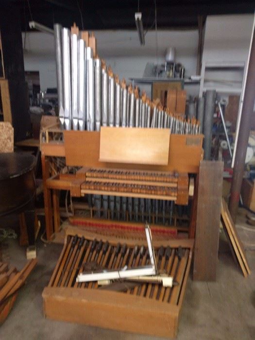 This is a massive Pipe Organ with an estimated 200-250 zinc & wooden pipes, as well as other parts including the wind chest.