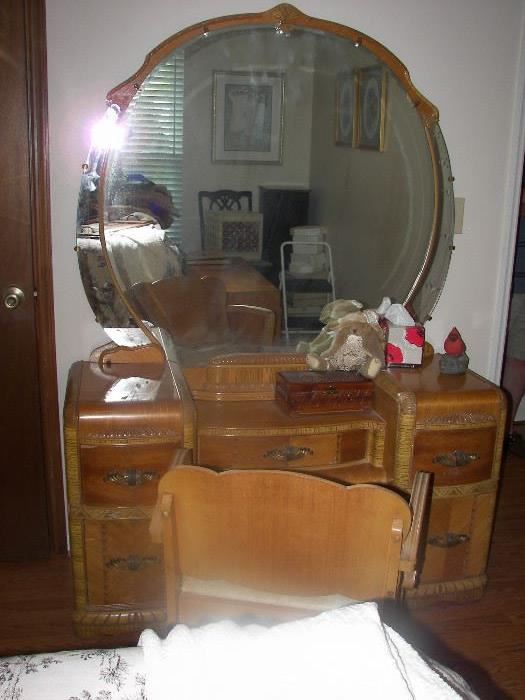 dressing table with large round mirror and bench