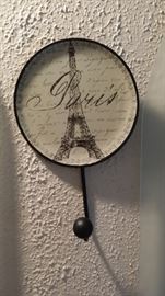 wall clock states paris and displays Eiffel Tower