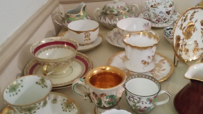 huge collection of tea cups and saucers