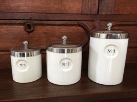 Set of three porcelain canisters
