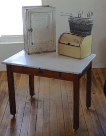 Antique porcelain top table with wood legs, old pie cupboard, bread tin and fry baskets