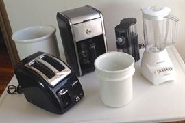 Small kitchen appliances including toaster, coffee maker, coffee grinder, blender