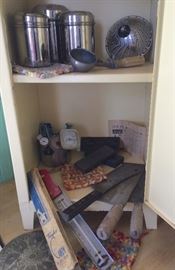 Old pie cabinet, candy thermometer, ice cream scoop, sharpening stones...
