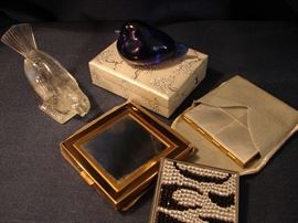 Three name brand new compacts, two flirty glass birds