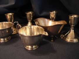 Sterling sugar and creamer, two pairs candlesticks.
