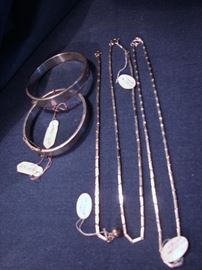 Sterling Baht chains and bangle bracelets that have never had the price tags removed from the 1970s.
