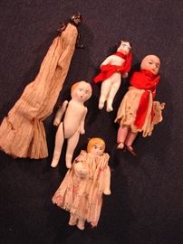 Charming tiny dolls from that fascinating trunk.