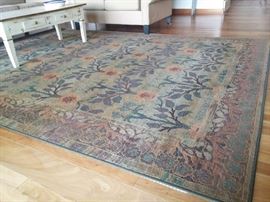 Beautiful muted rom size rug