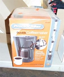 new i n box 'durable' coffee maker.... TENT SALE MAIN STORE AVON