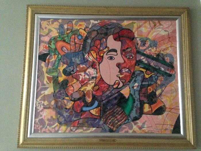 “Self Portrait,” a horizontal,
polychromatic, figurative and
abstract serigraph-on-board
attributed to Yankel Ginzburg
depicting a surrealistically
drawn human face in shades
of red, orange, yellow, green,
blue, indigo and violet. The
piece is framed. The piece is
marked “Artist Proof” in blue in
the bottom left side. It is signed “Yankel Ginzburg” in blue in the
bottom right corner. The piece is 41.5 inches wide and 34.5 inches
high including the frame. The composition is roughly 34 inches
wide and 22 inches high.