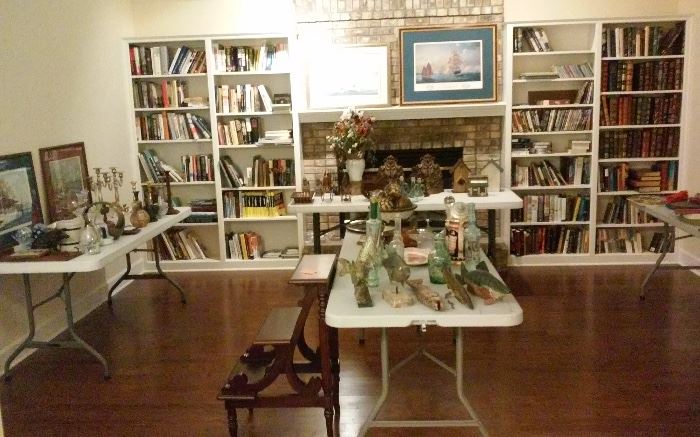 Lots of books, decor, kitchen ware.,.