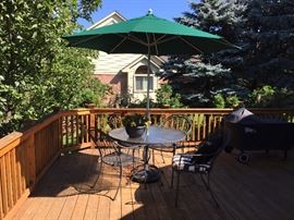 WOODARD PATIO TABLE W/4 CHAIRS WITH CUSHIONS & UMBRELLA
