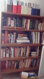These are stacked bookcases full of misc books