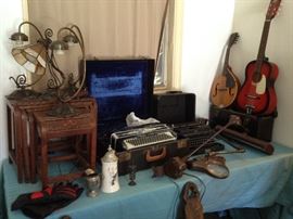 •	Guitar
•	Banjo
•	1940s Upright Musette Piano
•	Antique Accordion 
•	1980s portable Casio keyboards
