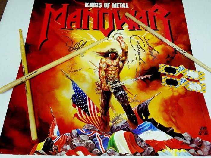 Autographed Manowar Poster with Drumstick 