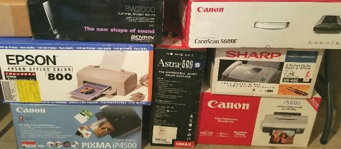 Many products still in original boxes - printers and scanners