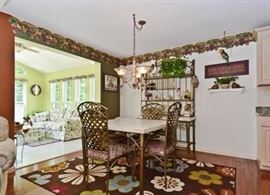 Quartz Top & Iron Dinette with Four Chairs, Floral Rug, Quartz & Iron Bakers Rack