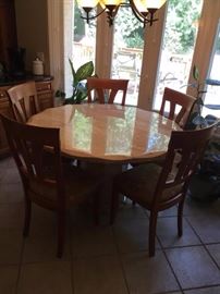 marble pedestal dining table