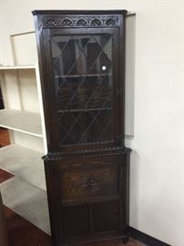 Corner cabinet with leaded glass door