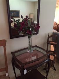 Rosewood display table with lower shelf