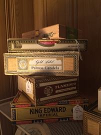 Approximately 30 cigar boxes