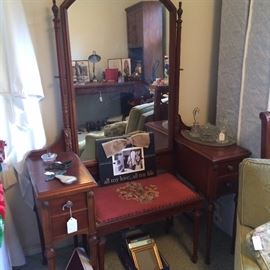 Antique vanity, mirror and inserted vanity bench