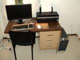 Flat screen; computer; printer; table