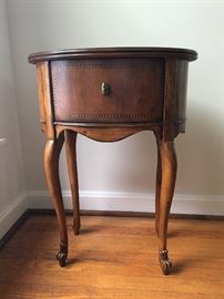 N Drexel Heritage French Accents oval accessory table. 13" W 20" L 27" H.  Sold with matching coffee table.