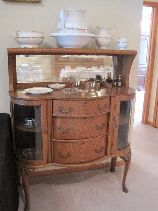 Antique oak cabinet. Antique glass and china.
