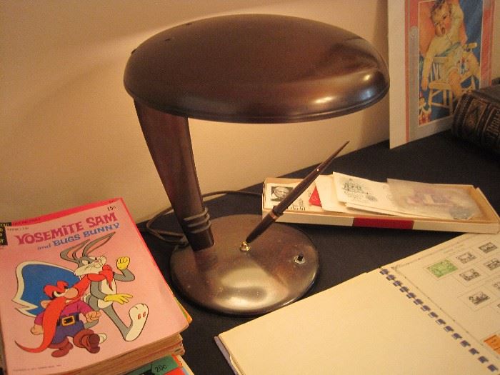 Stamp collection. Cool desk lamp.