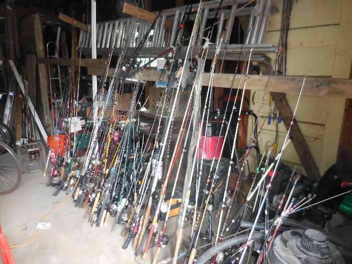 THIS IS ONE SIDE OF THE GARAGE!! FISHING POLES!!
