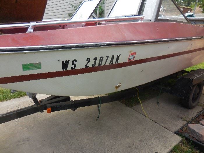 Trailer with Boat $175. Mercury 85 Horse Power Outboard.
