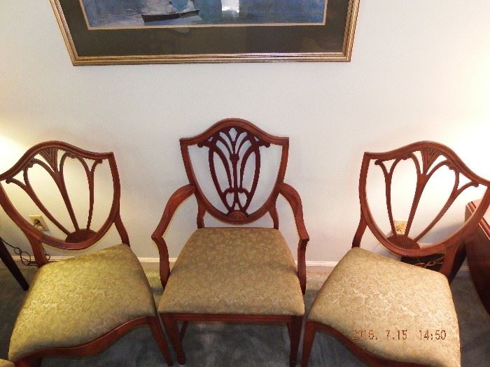 6 dining chairs: 2 arm and 4 side chairs beautifully structured and great craftsmanship 150.00