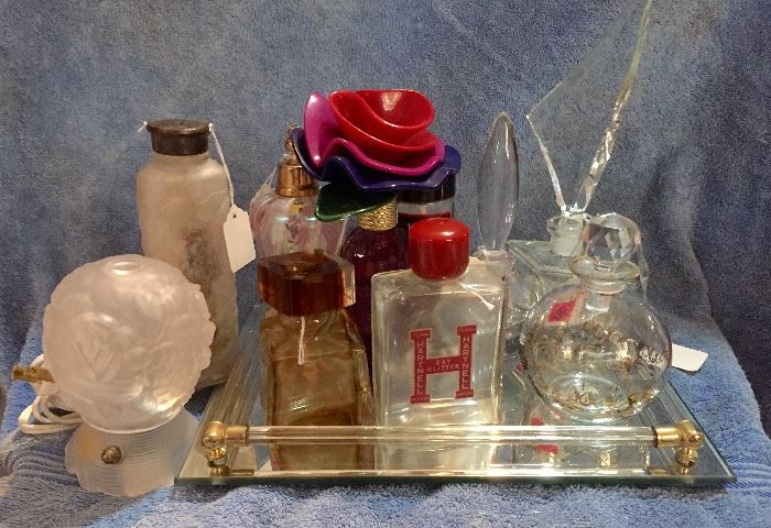 Some of the MANY perfume bottles and other vanity items. 