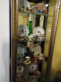 Display cabinet with cups and saucers gathered from around the world