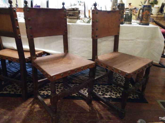 Set of 8 Spanish leather dining chairs.  Varying degrees of wear but all are ready to use.