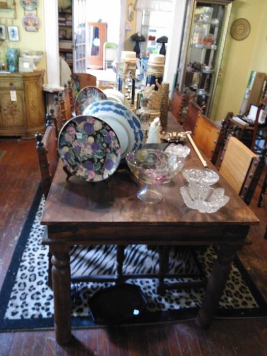 Table is 8 feet long, 3 feet wide, 31" high, 25" inch to the skirt.  The chairs are being sold separately, they can use some rehab but are very interesting.