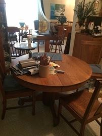 vintage oak dining table with 5 oak cushion chairs