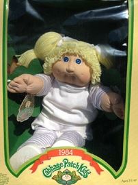Vintage Cabbage Patch Doll,  girl, blond pig tails, blue eyes. 16" doll manufactured 1984.  All original clothing. New in box! Box is in great condition.  