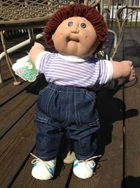 Vintage Cabbage Patch Doll, Boy, red hair, brown eyes. Manufactured 1978-1982. All original clothing. New in box. 16" long. 