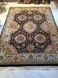 100% Wool Rug, hand tied, measures: 4 x 6. Excellent condition.