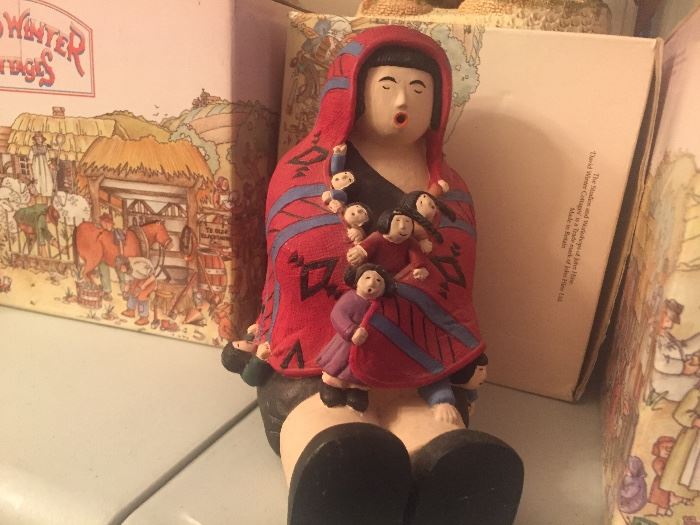 Chinese doll of health and healing.  She weighs a ton, so she could sculpt your arms!